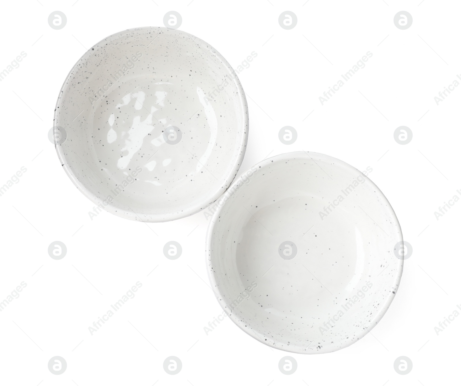 Photo of Beautiful empty ceramic bowls on white background, top view