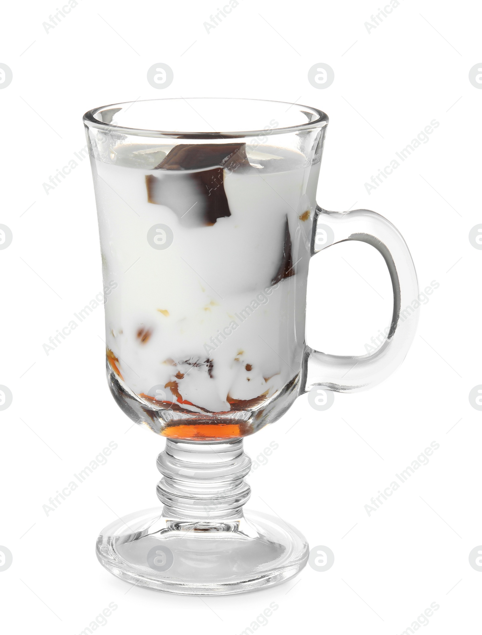 Photo of Glass cup of milk with delicious grass jelly isolated on white