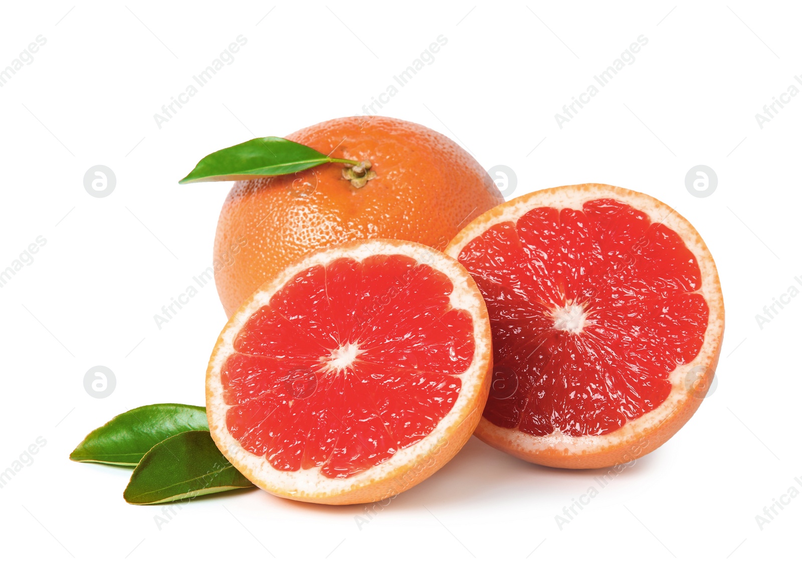 Photo of Whole and cut ripe grapefruits isolated on white