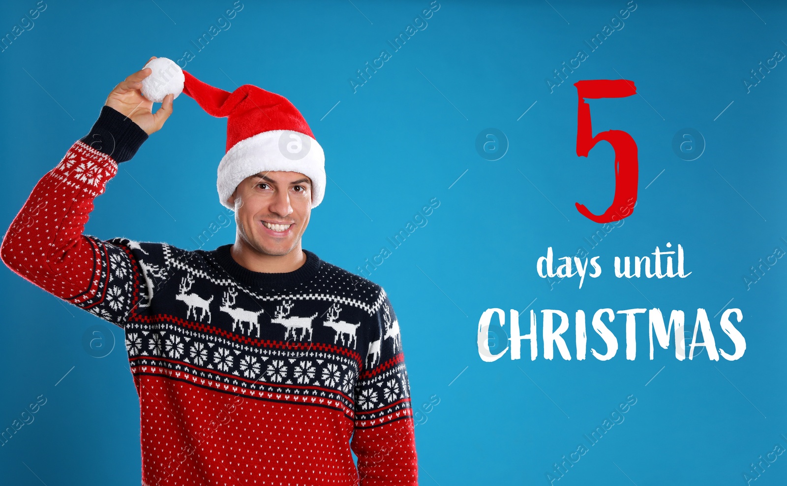 Image of Christmas countdown. Happy man wearing Santa hat on blue background near text