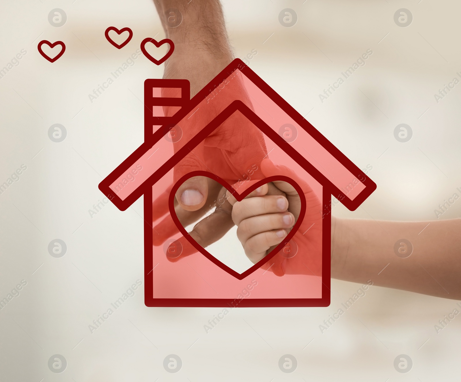 Image of Father holding hands with child and illustration of house indoors, closeup. Adoption concept