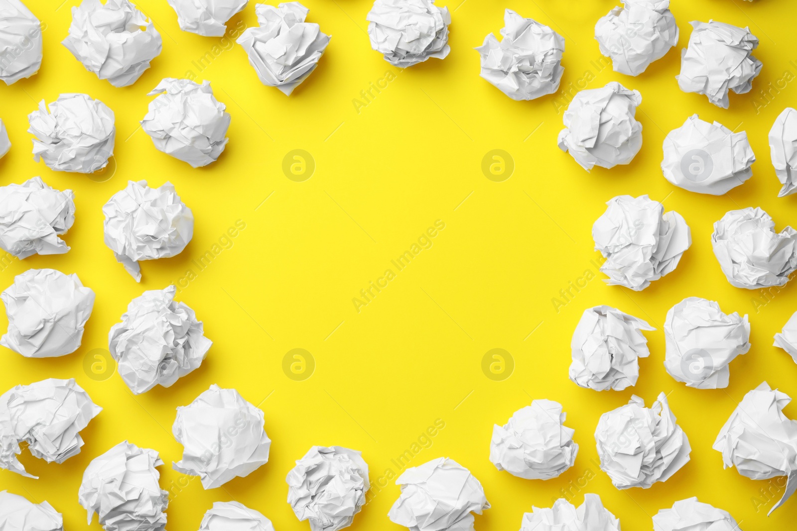 Photo of Frame made of paper balls on color background, flat lay. Space for text