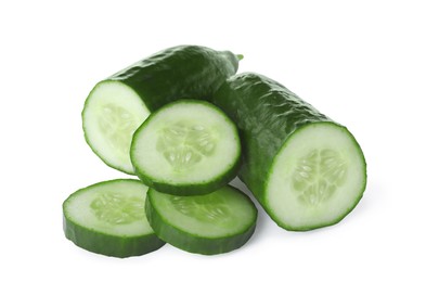 Cut fresh green cucumber isolated on white