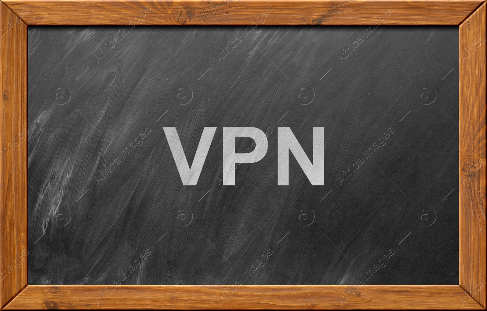 Image of Acronym VPN written on blackboard. Secure network connection