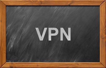 Image of Acronym VPN written on blackboard. Secure network connection