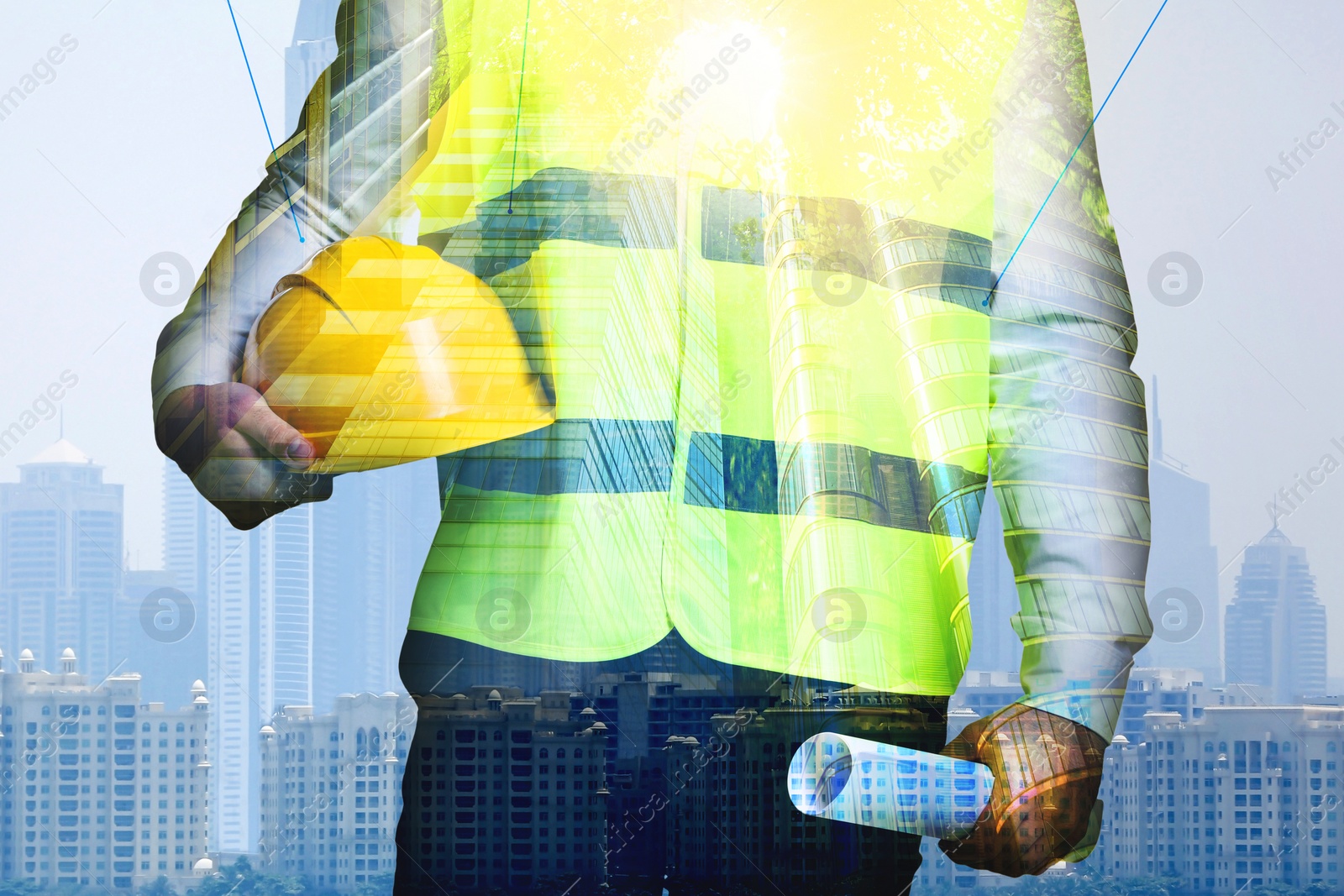 Image of Engineer with hard hat and cityscapes, multiple exposure