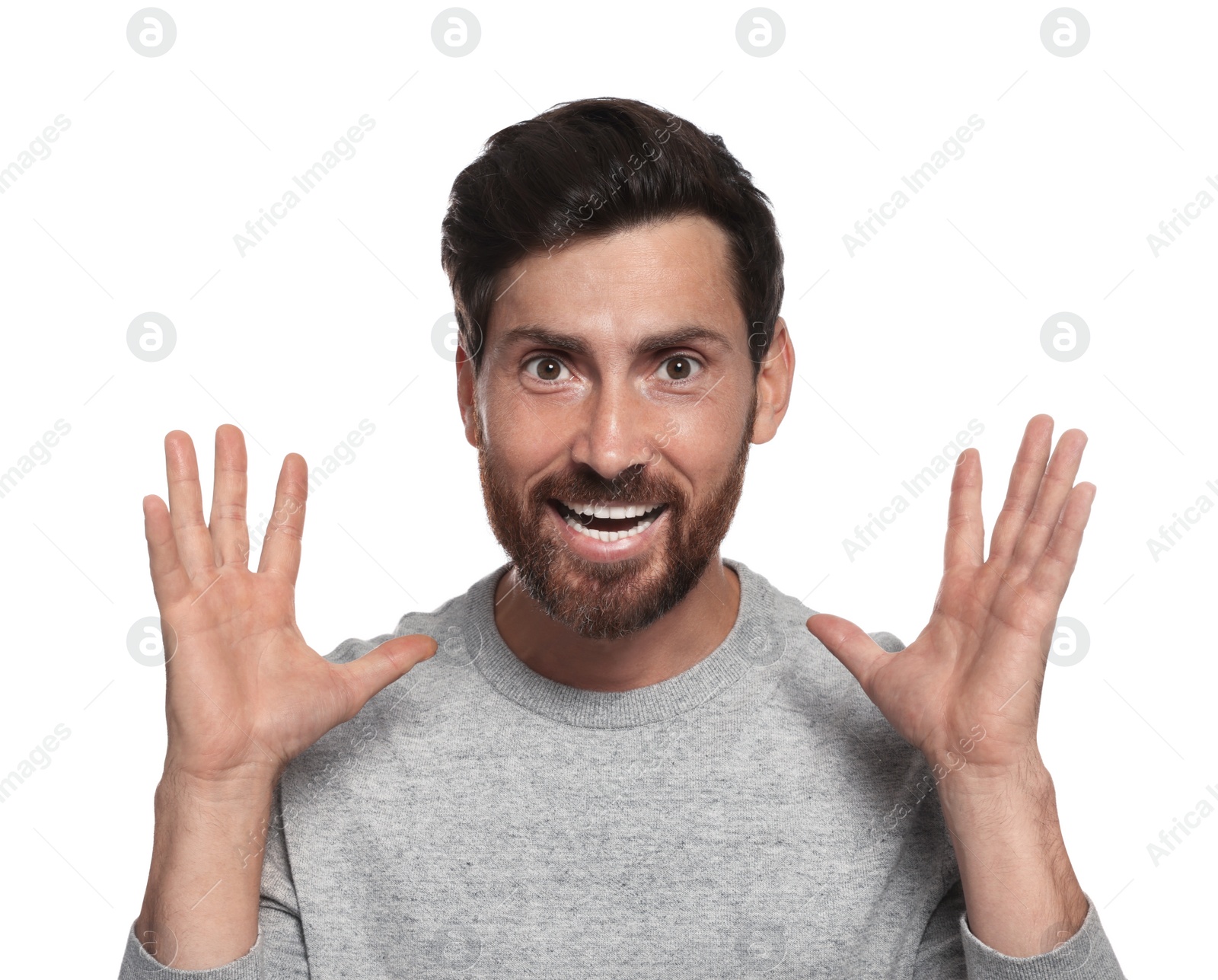 Photo of Portrait of emotional bearded man on white background