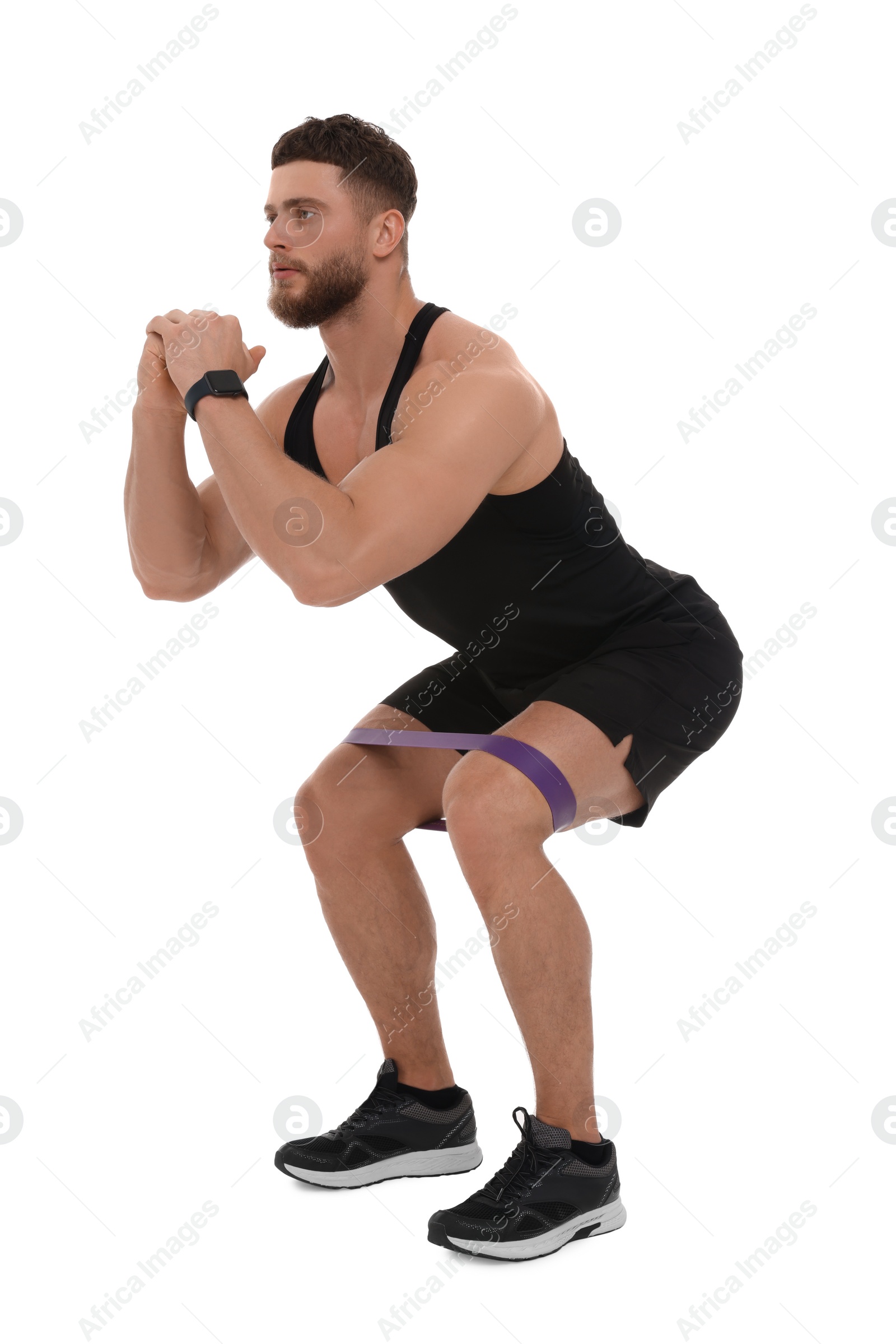 Photo of Young man exercising with elastic resistance band on white background