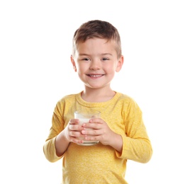 Cute little boy with glass of milk on white background