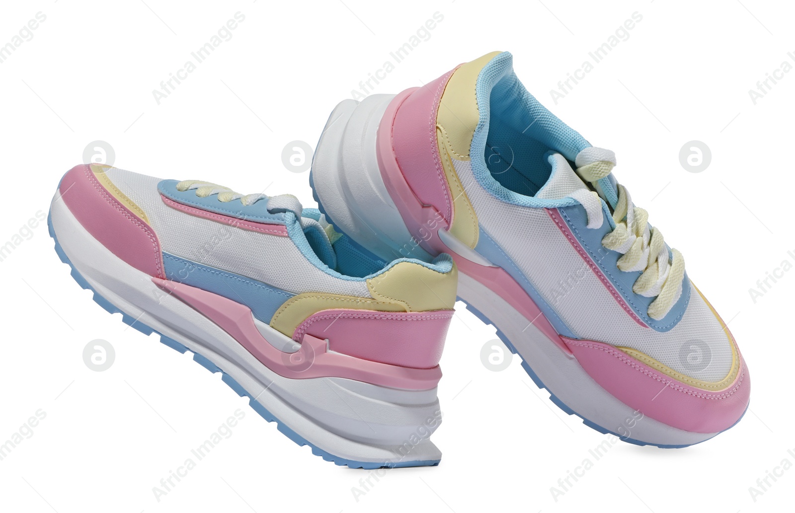 Photo of Pair of stylish colorful sneakers on white background