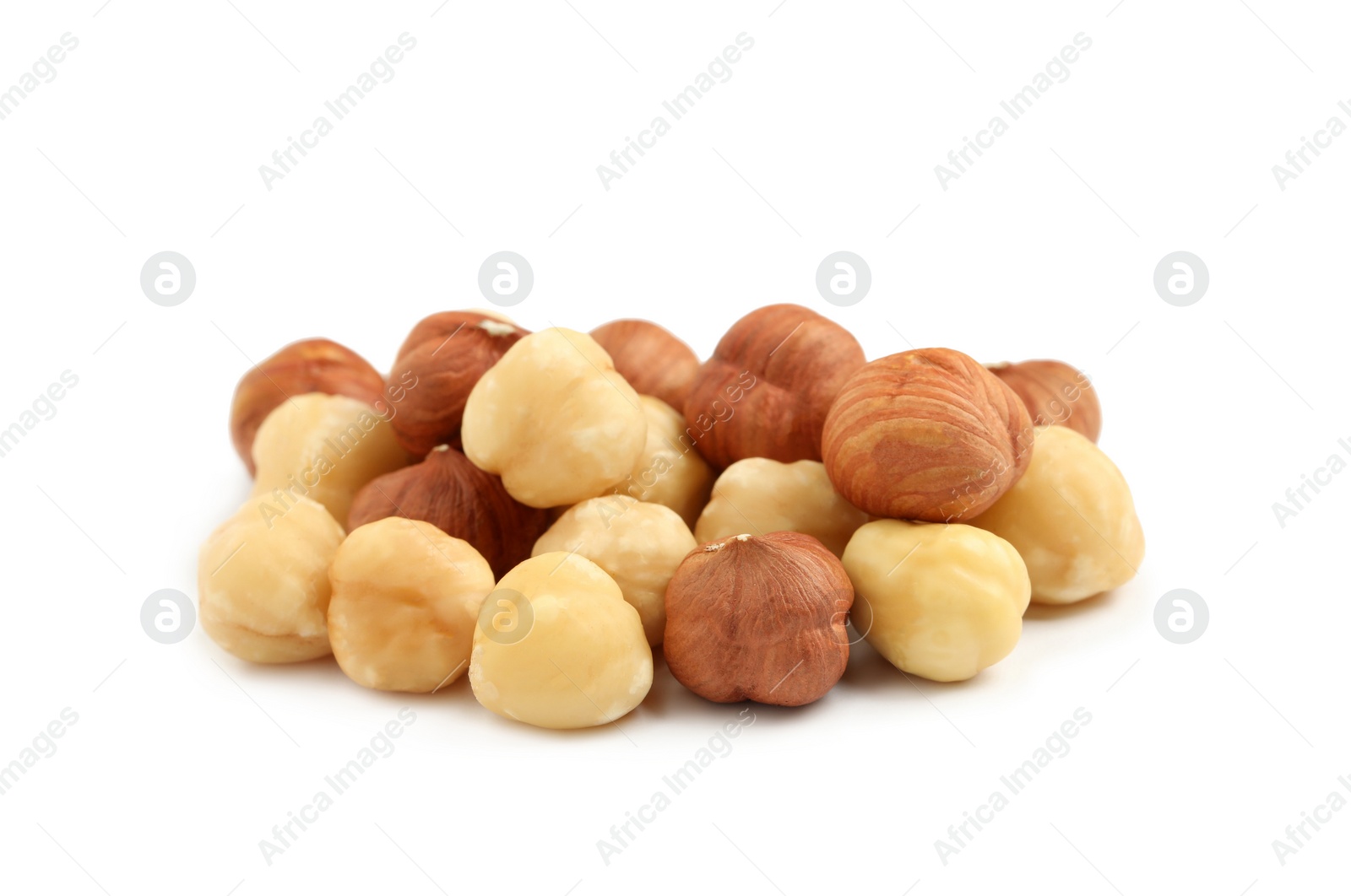 Photo of Heap of tasty hazelnuts on white background