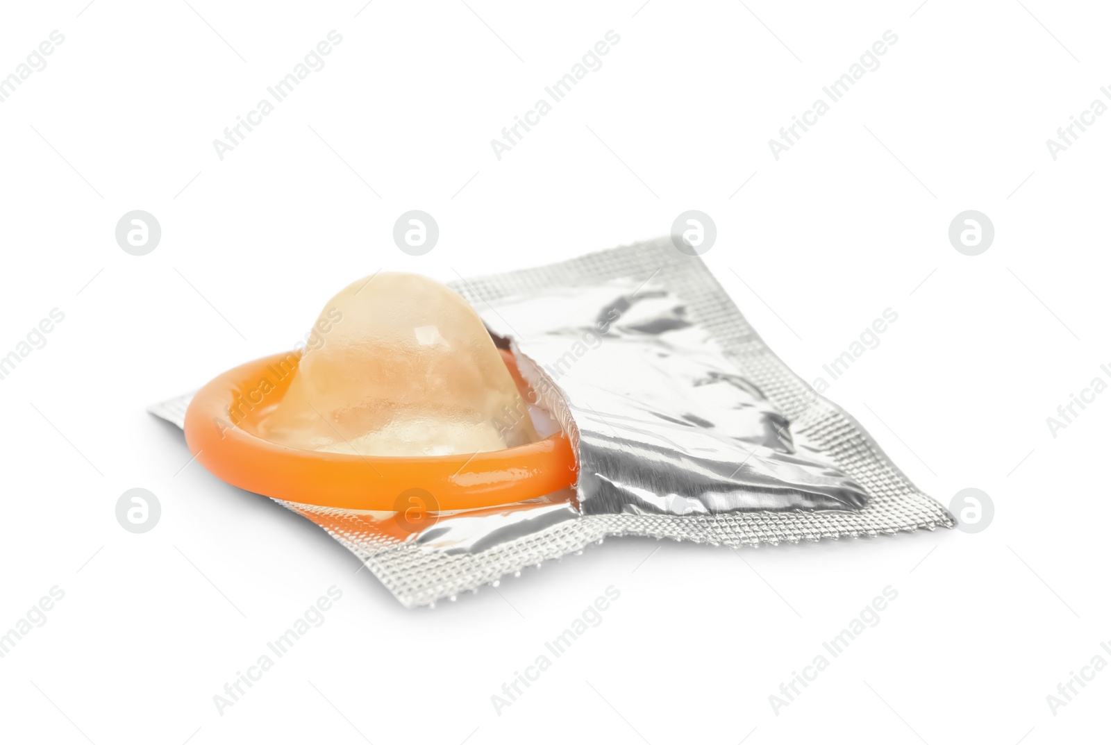 Photo of Unpacked orange condom isolated on white. Safe sex