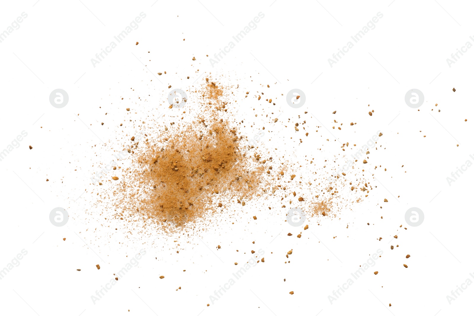 Photo of Pile of brown dust scattered on white background