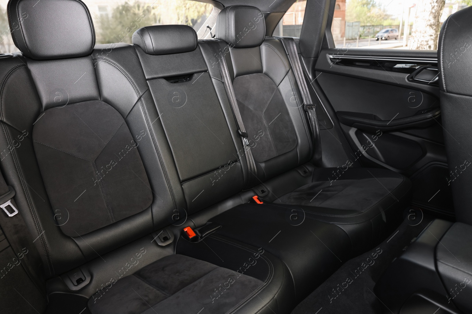 Photo of Clean leather seats inside of modern black car