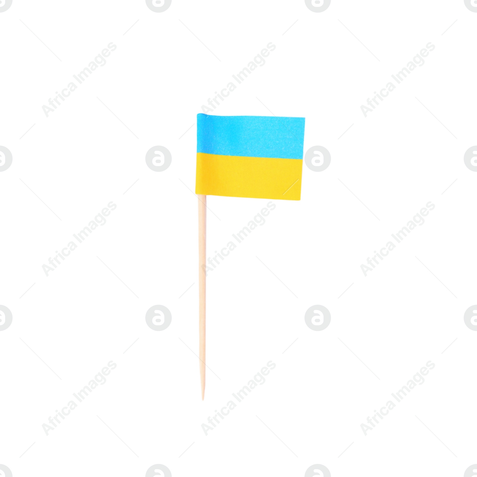 Photo of Small paper flag of Ukraine isolated on white, top view