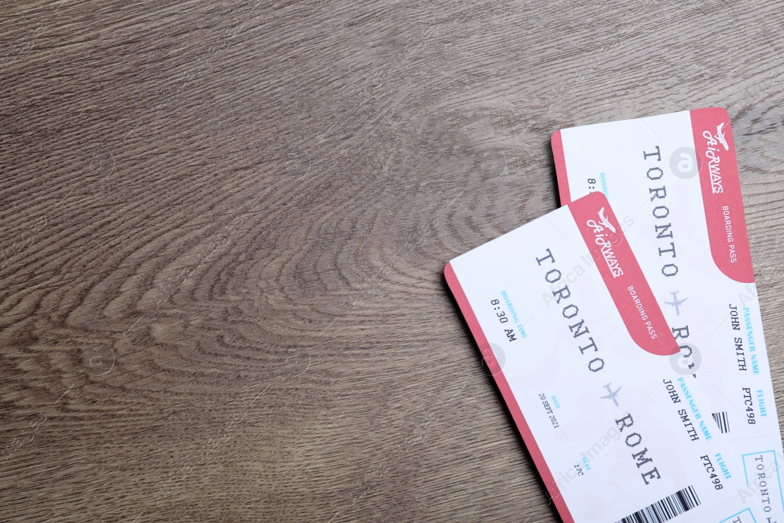 Photo of Tickets on wooden table, flat lay with space for text. Travel agency concept