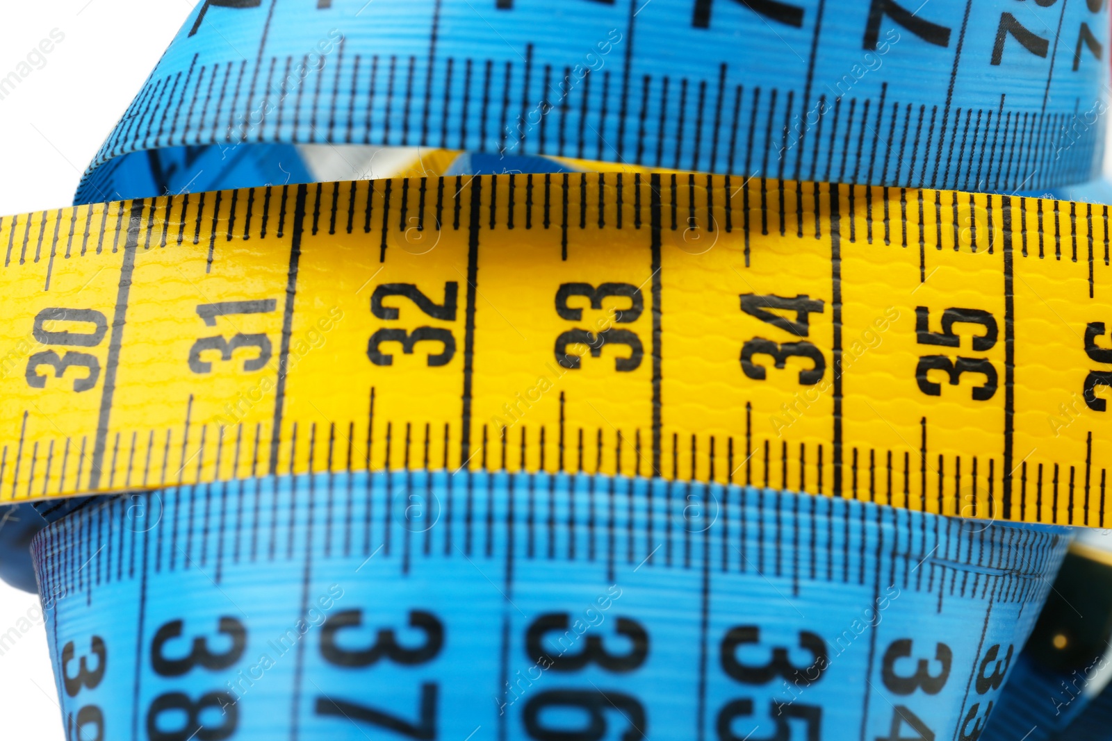 Photo of Different measuring tapes, closeup