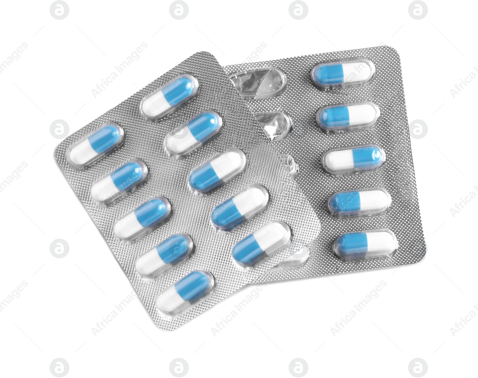 Photo of Blisters of pills on white background, top view