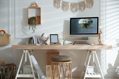 Stylish home office interior with comfortable workplace