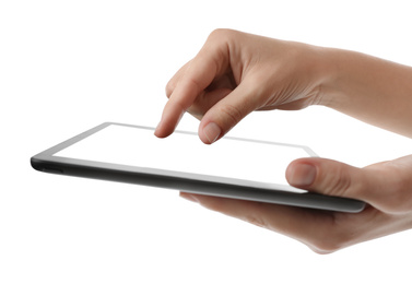 Photo of Woman using tablet computer with blank screen on white background, closeup. Modern gadget