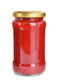 Tasty tomato sauce in glass jar isolated on white