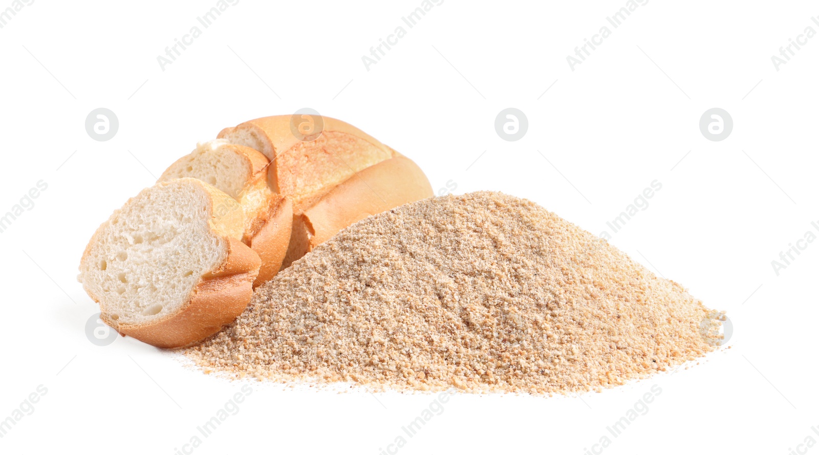 Photo of Pile of fresh bread crumbs and sliced loaf on white background