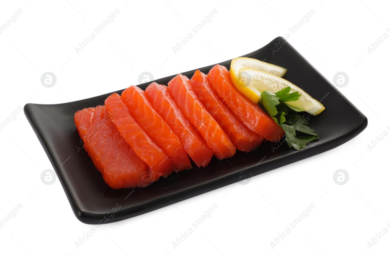 Photo of Delicious salmon sashimi served with lemon and parsley isolated on white