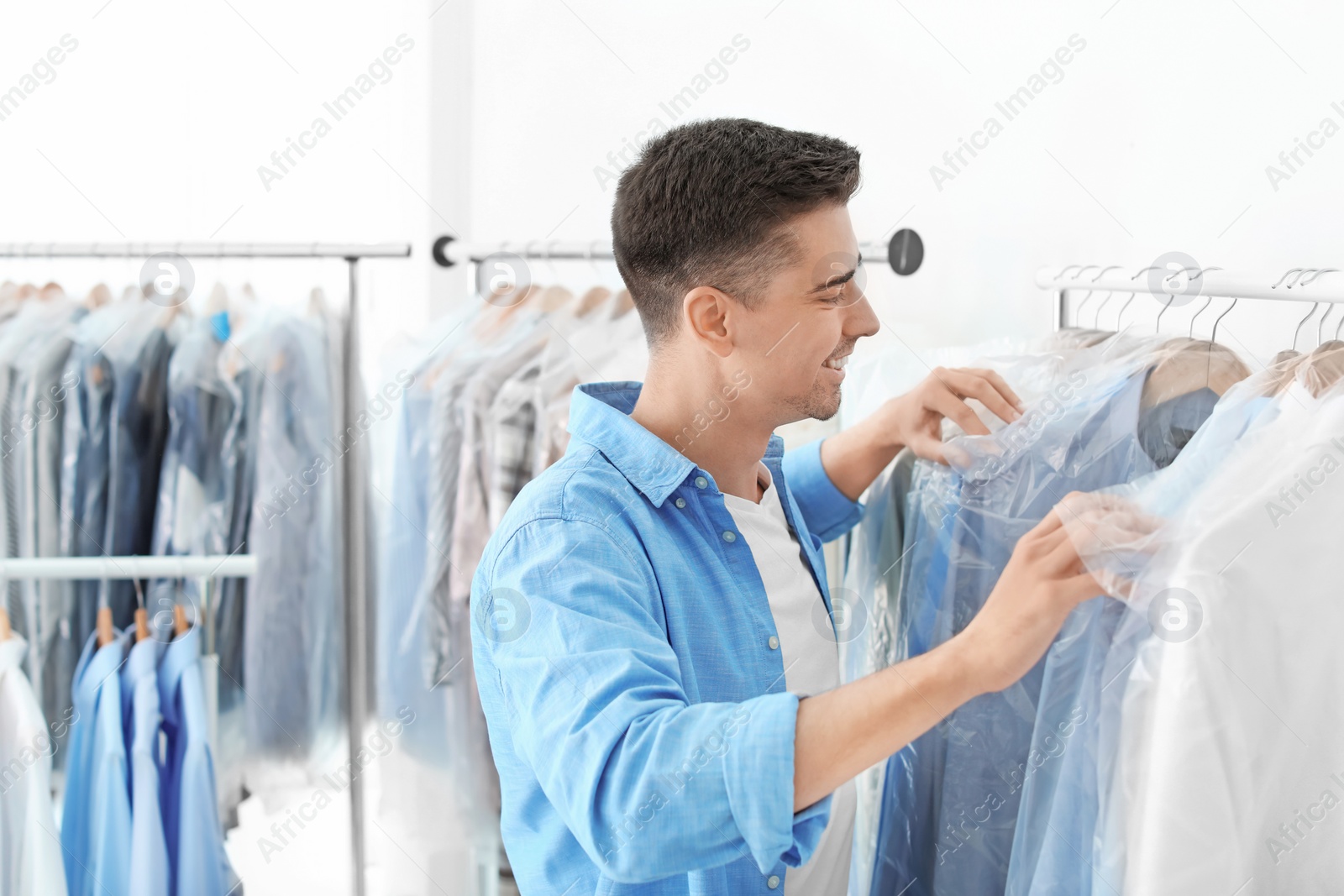 Photo of Employee working at dry-cleaner's