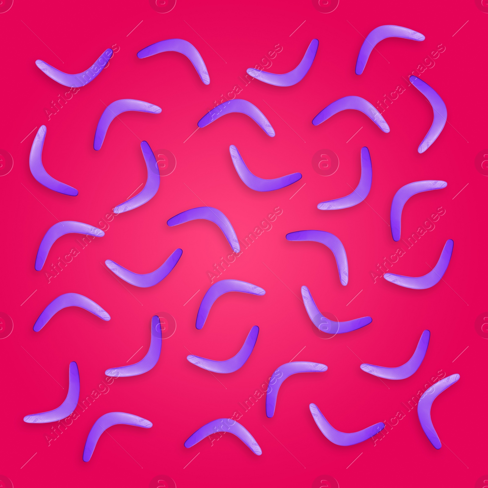 Image of Color boomerangs on pink background, flat lay