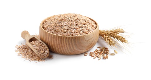 Photo of Wooden bowl and scoop with wheat bran on white background