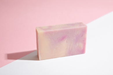 Photo of Hand made soap bar on color background