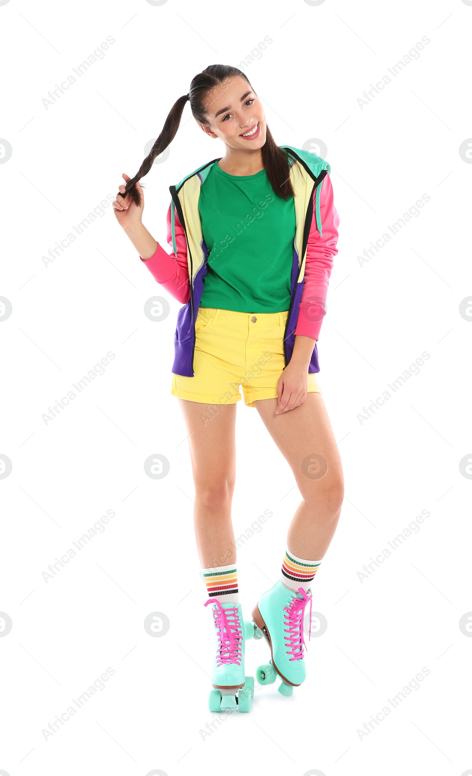 Photo of Full length portrait of young woman with roller skates on white background