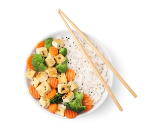 Bowl of rice with fried tofu, broccoli and carrots isolated on white, top view