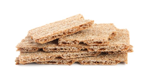 Pieces of crunchy rye crispbreads on white background