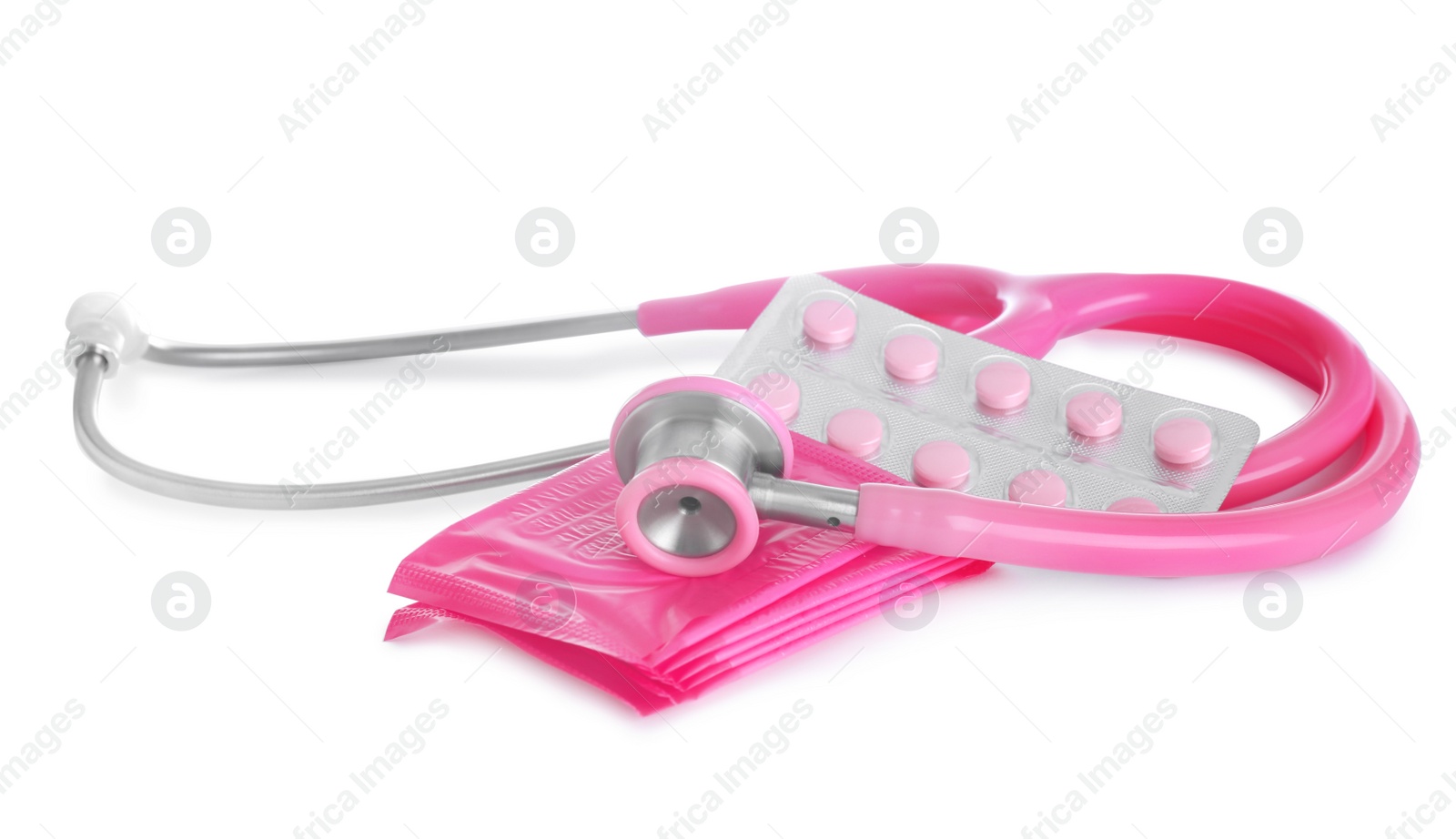 Photo of Stethoscope, menstrual pads and pills on white background. Gynecology concept