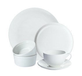 Set of beautiful ceramic dinnerware on white background