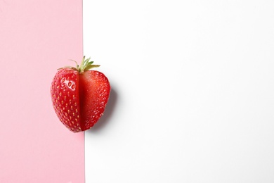 Photo of Fresh ripe strawberry on color background, top view