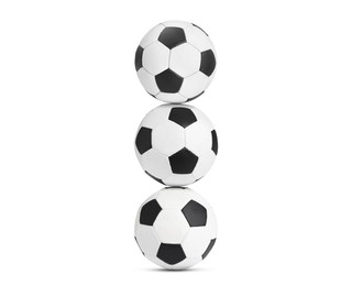 Image of Stack of soccer balls on white background