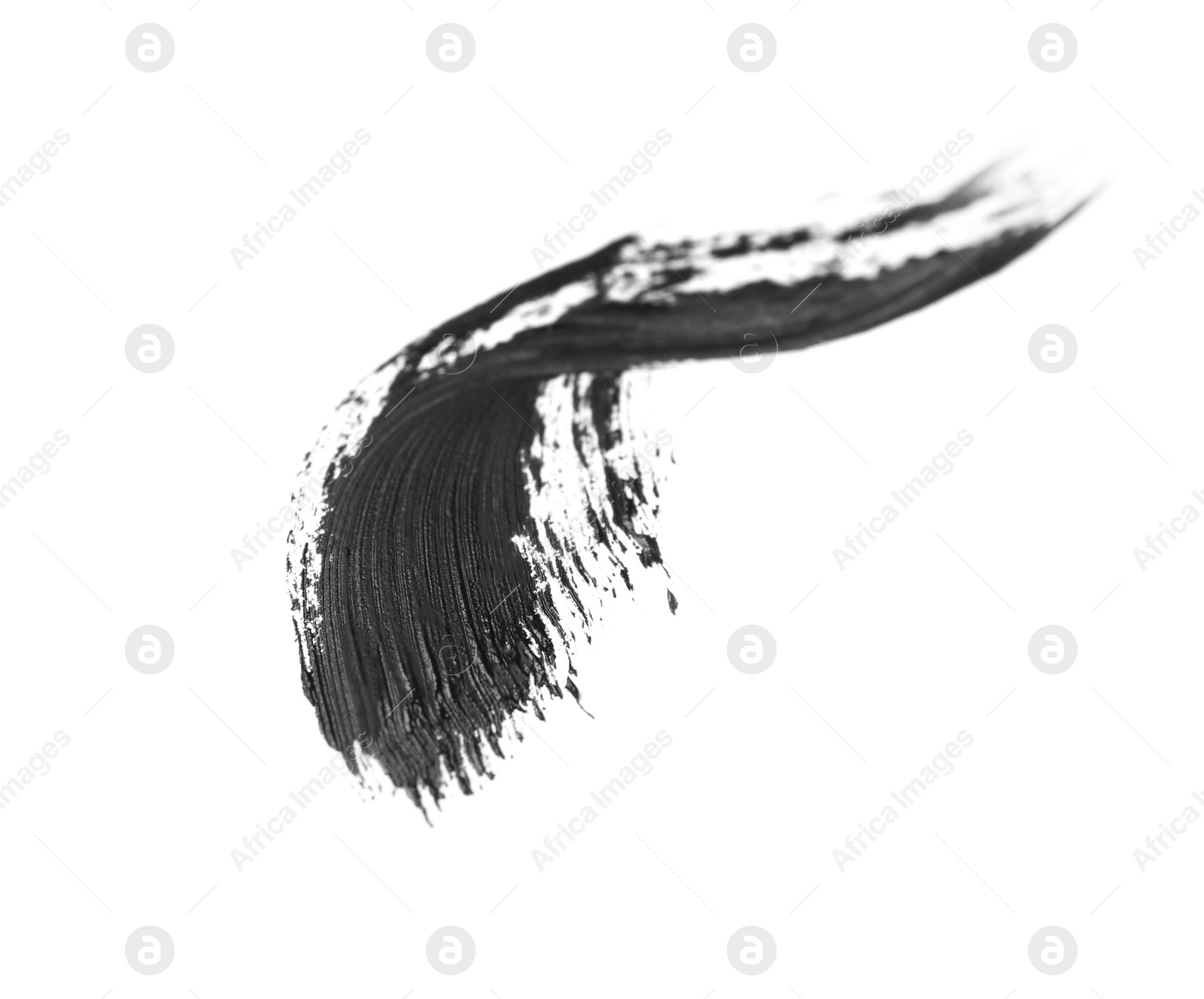 Photo of Smear of black mascara for eyelashes on white background