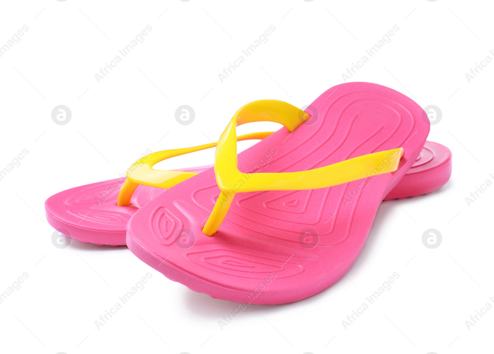 Photo of Pair of stylish pink flip flops isolated on white. Beach object