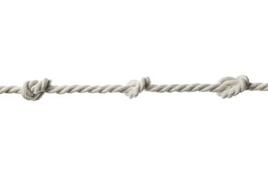 Photo of Cotton rope with knots on white background