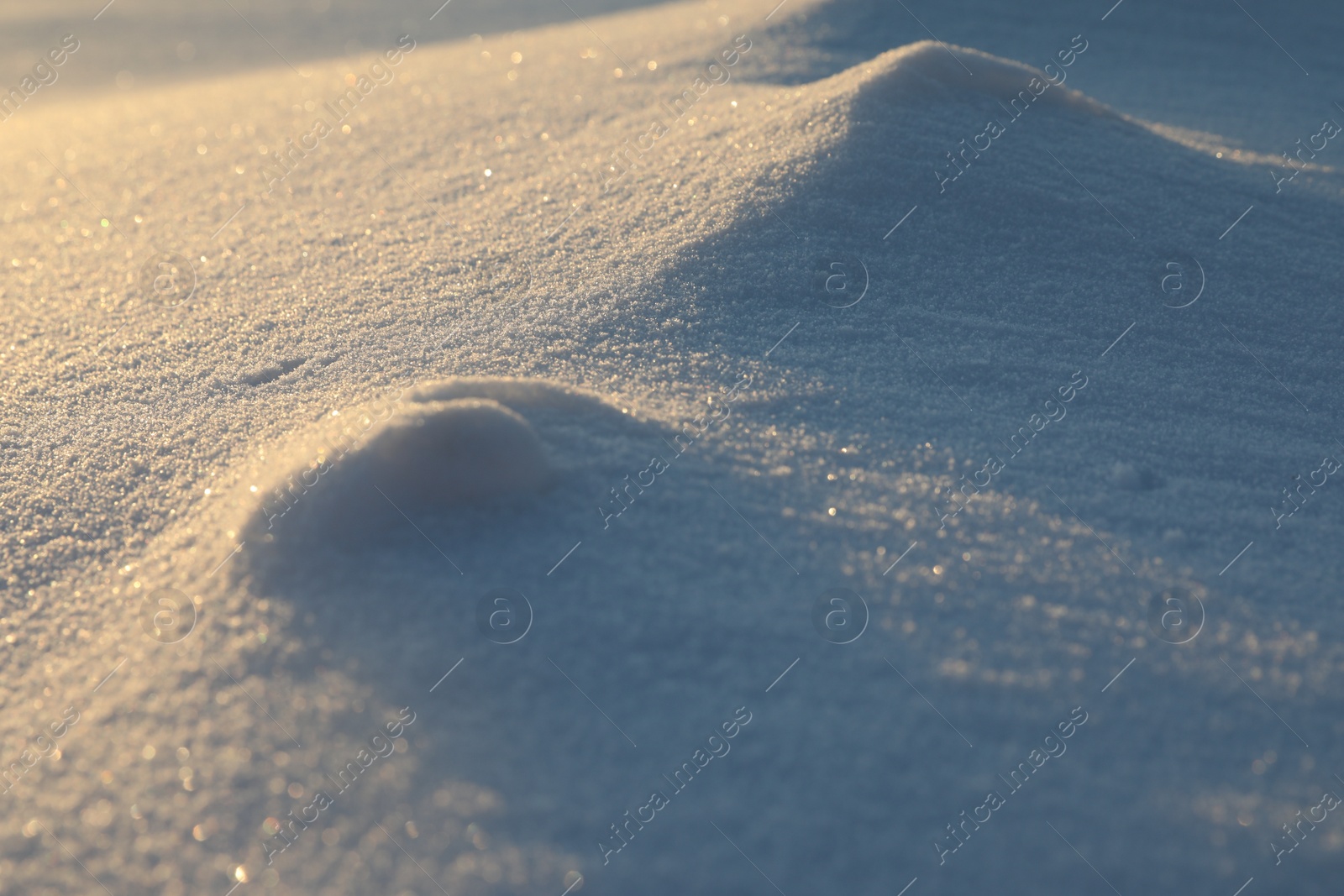 Photo of Beautiful snowdrift as background, closeup view. Winter weather