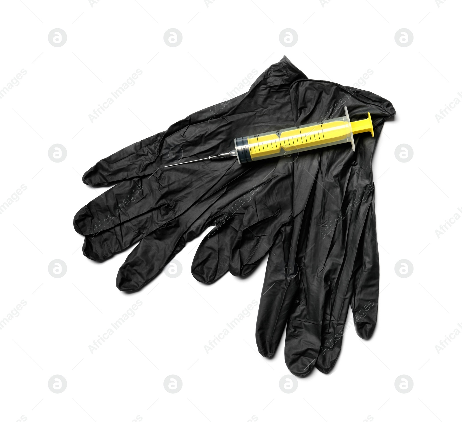 Photo of Medical gloves and empty syringe on white background, top view