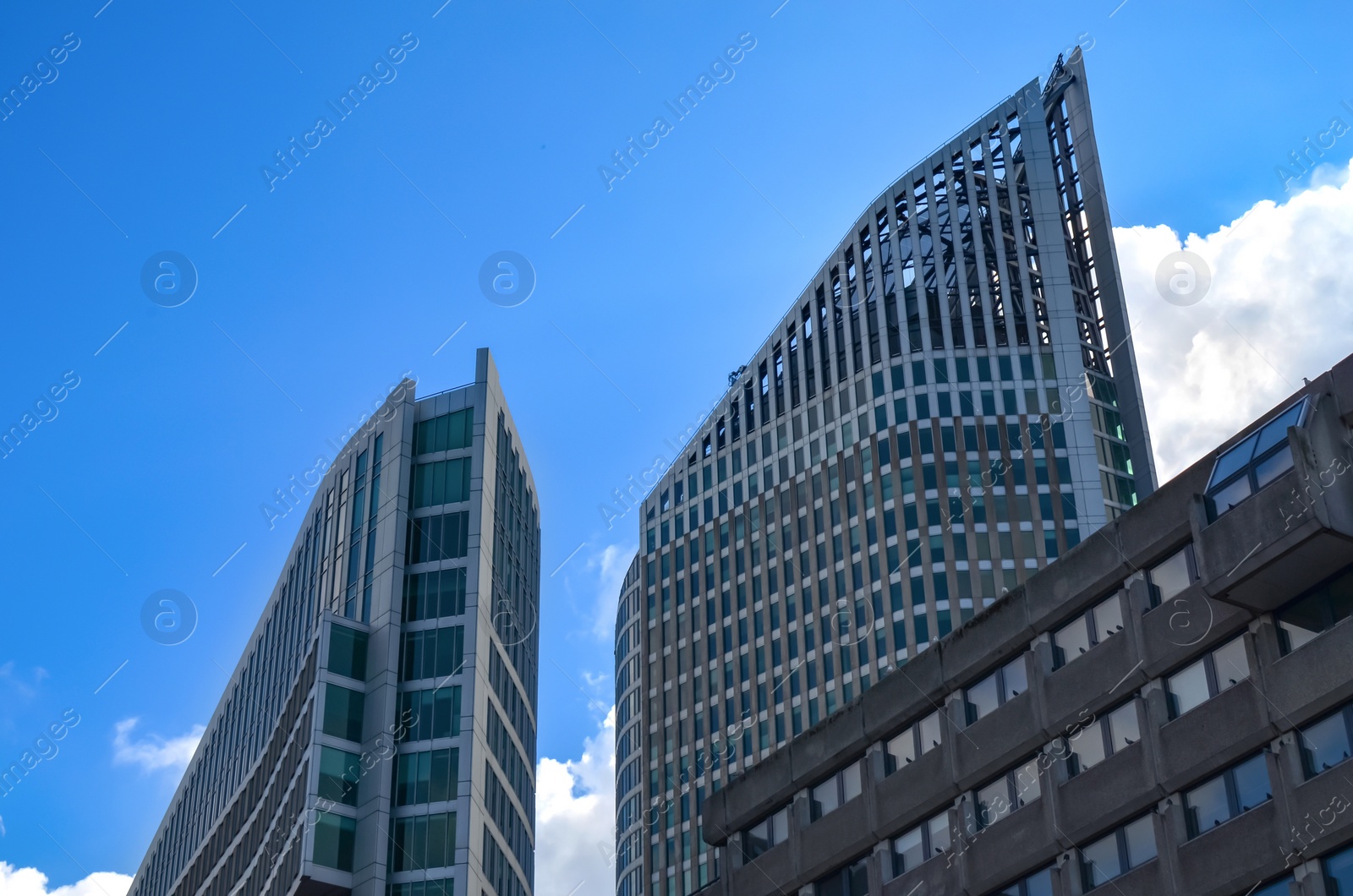 Photo of Beautiful view of cityscape with modern buildings on sunny day
