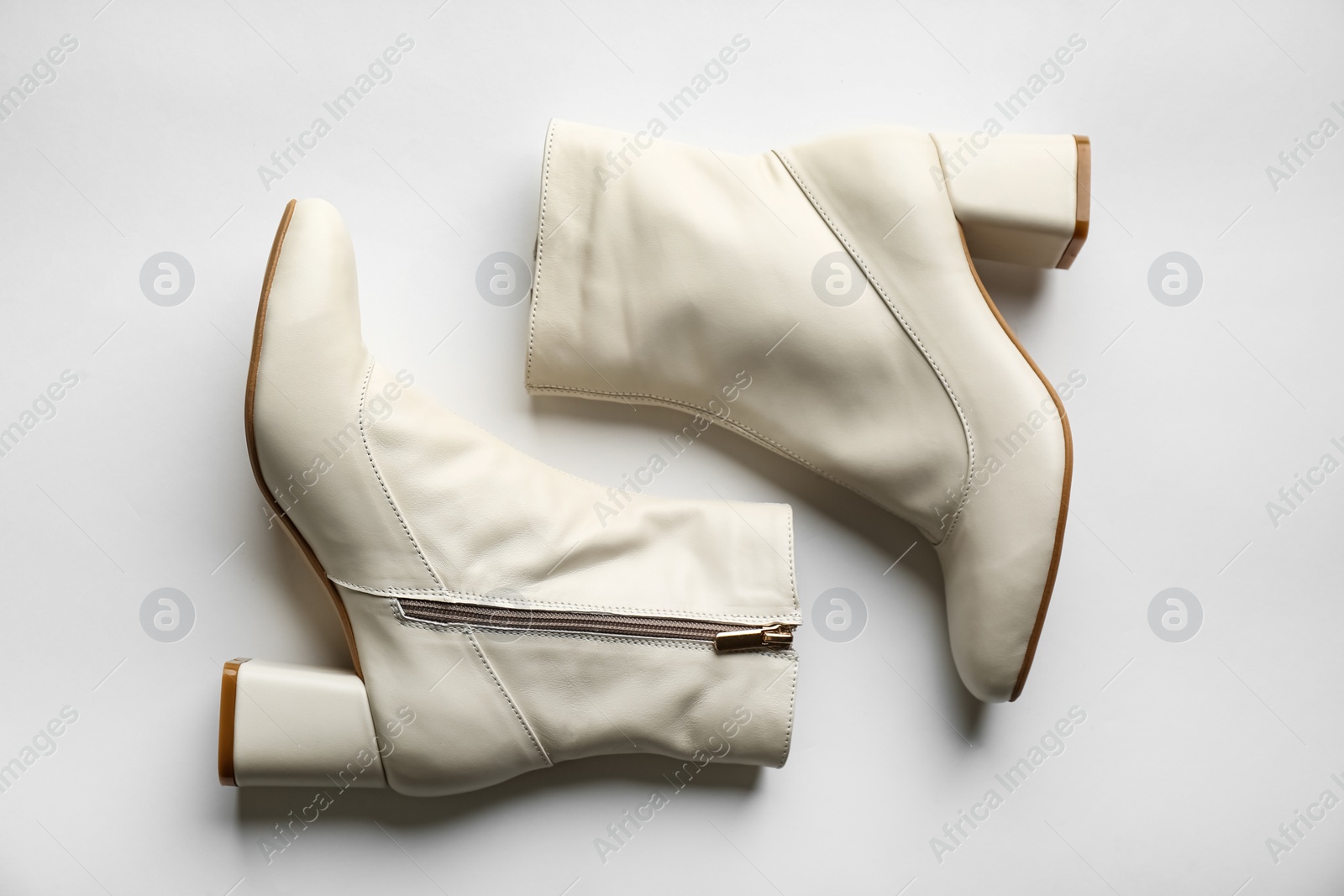Photo of Pair of stylish leather shoes on white background, top view
