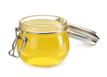 Photo of Tasty colorful jelly in glass jar on white background