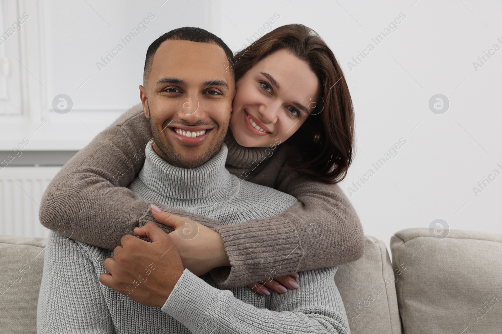 Photo of Dating agency. Happy couple enjoying time together at home