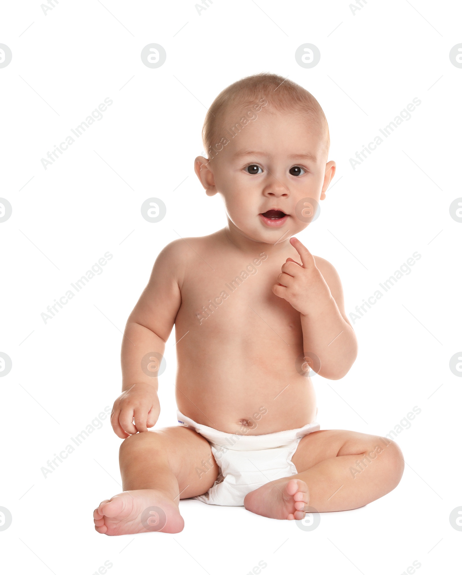 Photo of Cute little baby sitting on white background