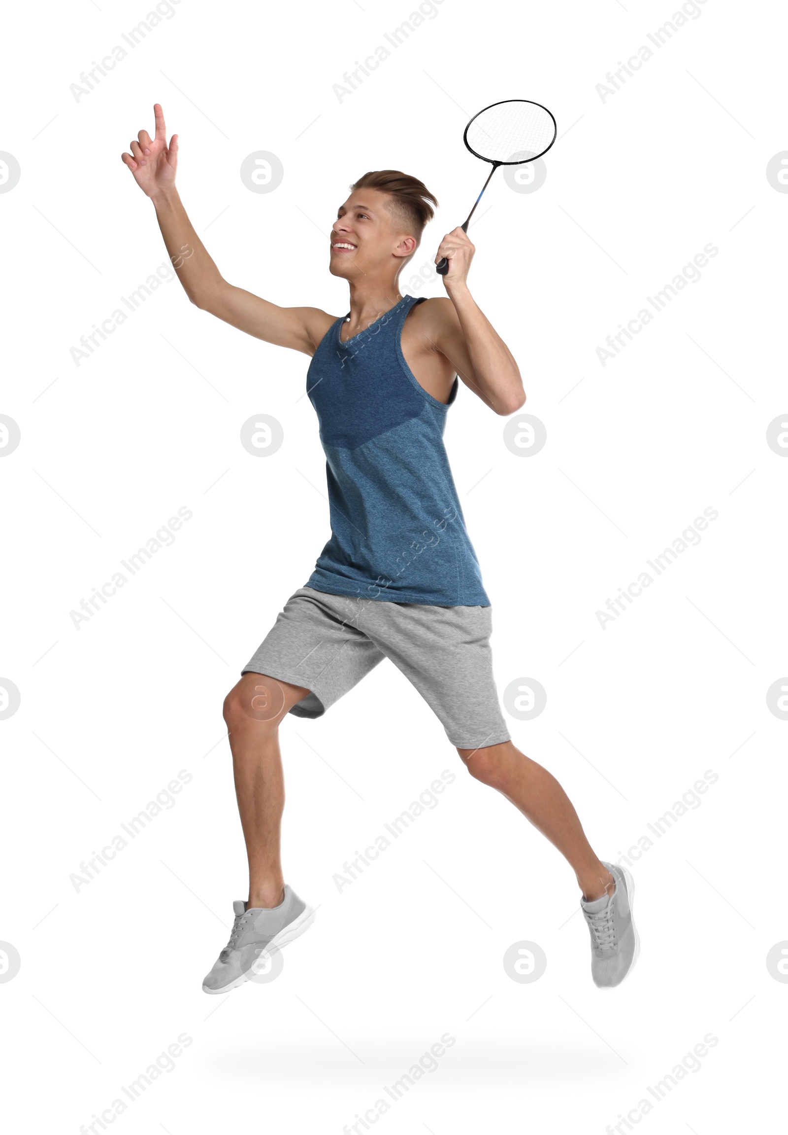 Photo of Young man playing badminton with racket on white background