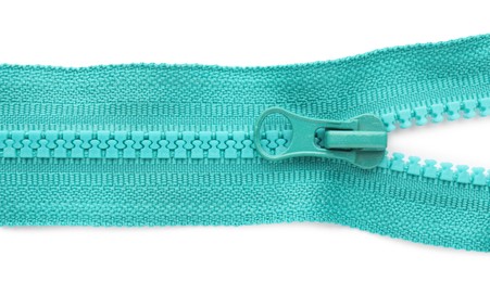 Photo of Turquoise zipper on white background, top view